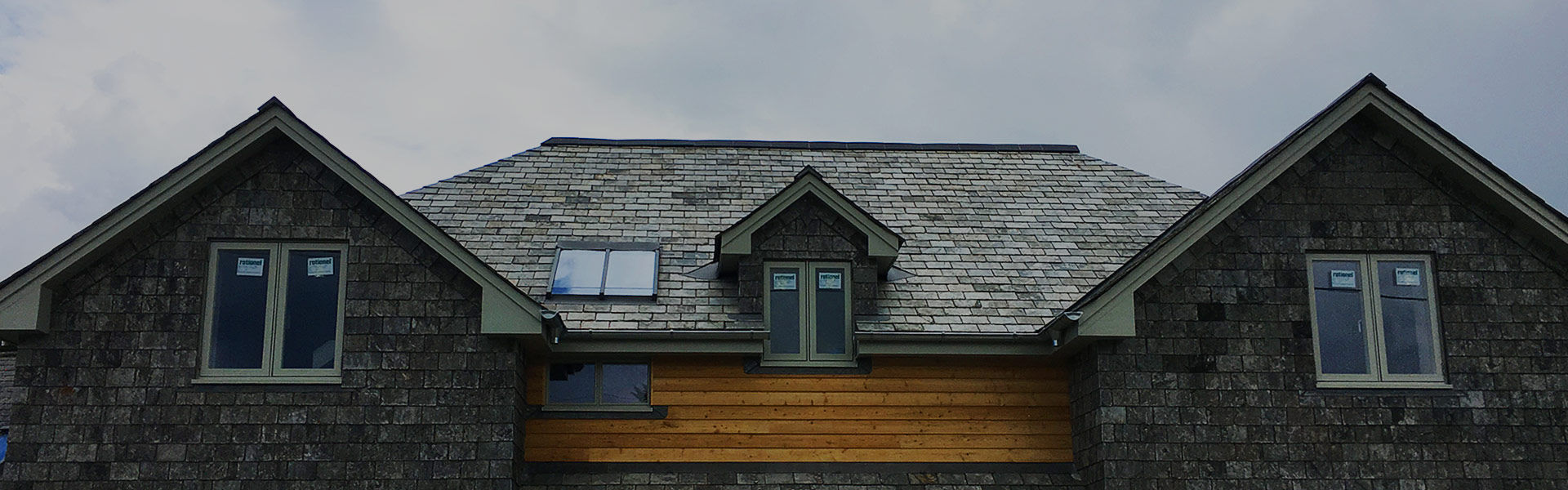 New slate roof with dormer windows